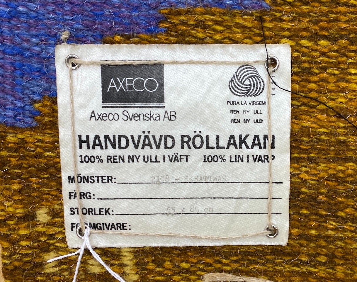 Two Axeco handvard tapestry rugs; Skrattner & Liljekonvalj, 55x88cm